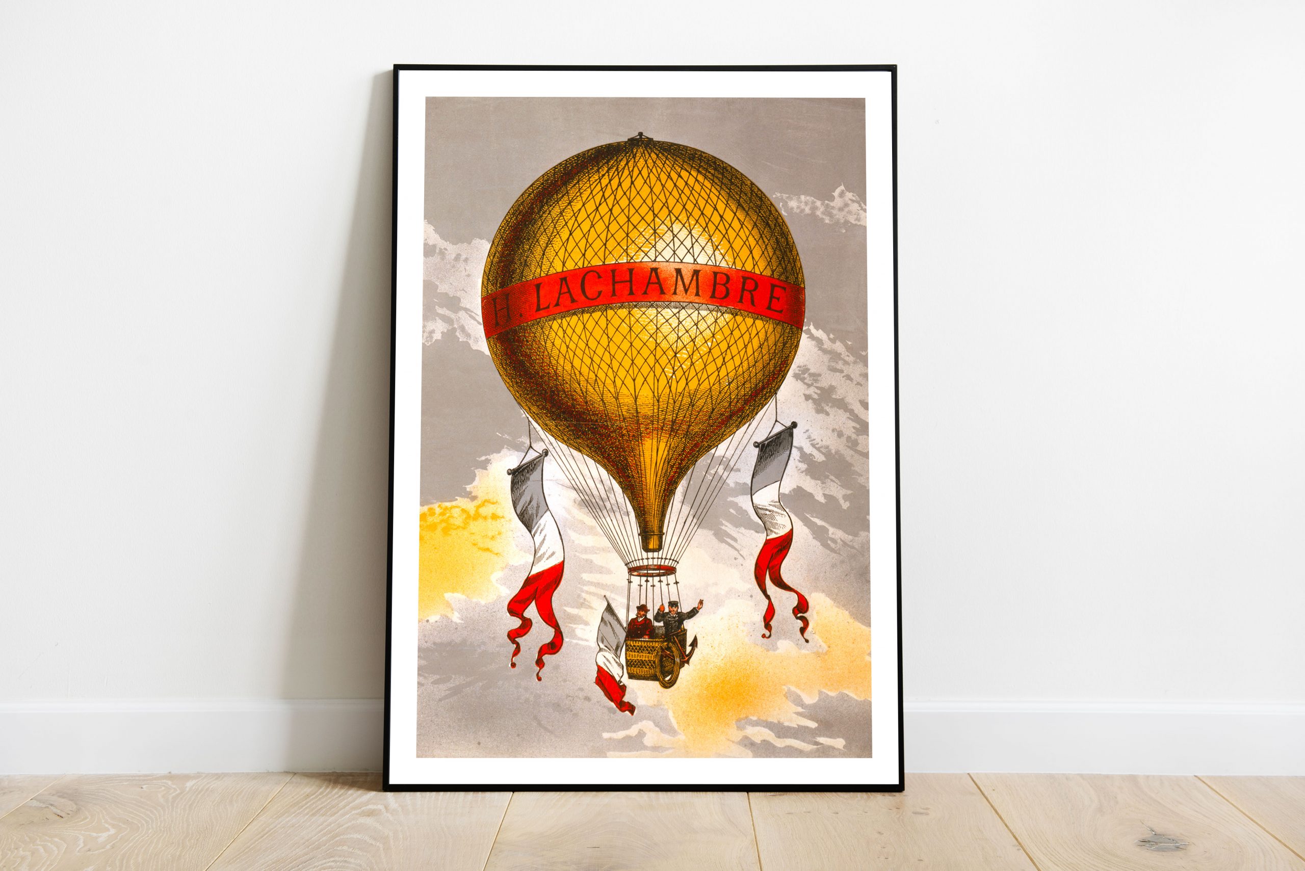Balloon labeled "H. Lachambre," with two men riding in the basket (1880)